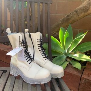 Leather white boots, clear soles. Futuristic AF.